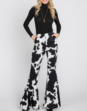 Load image into Gallery viewer, Cow Print Bell Bottoms
